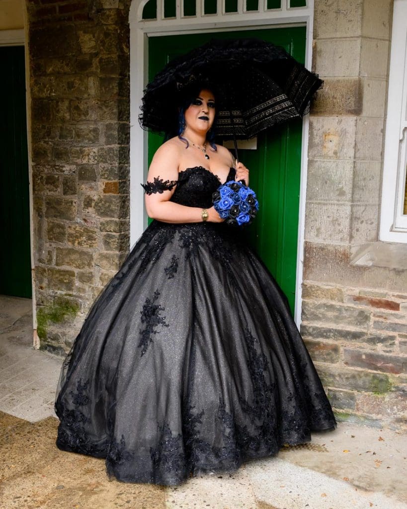 Maya  wearing her stunning black Gothic wedding dress
